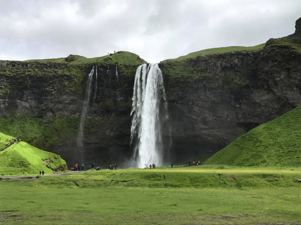 Visit Skógafoss waterfall in Iceland with kids